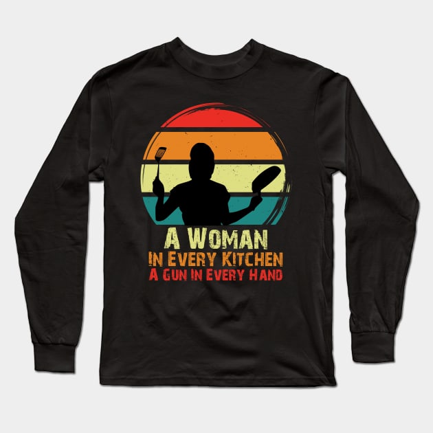 A Woman In Every Kitchen A Gun In Every Hand Long Sleeve T-Shirt by chidadesign